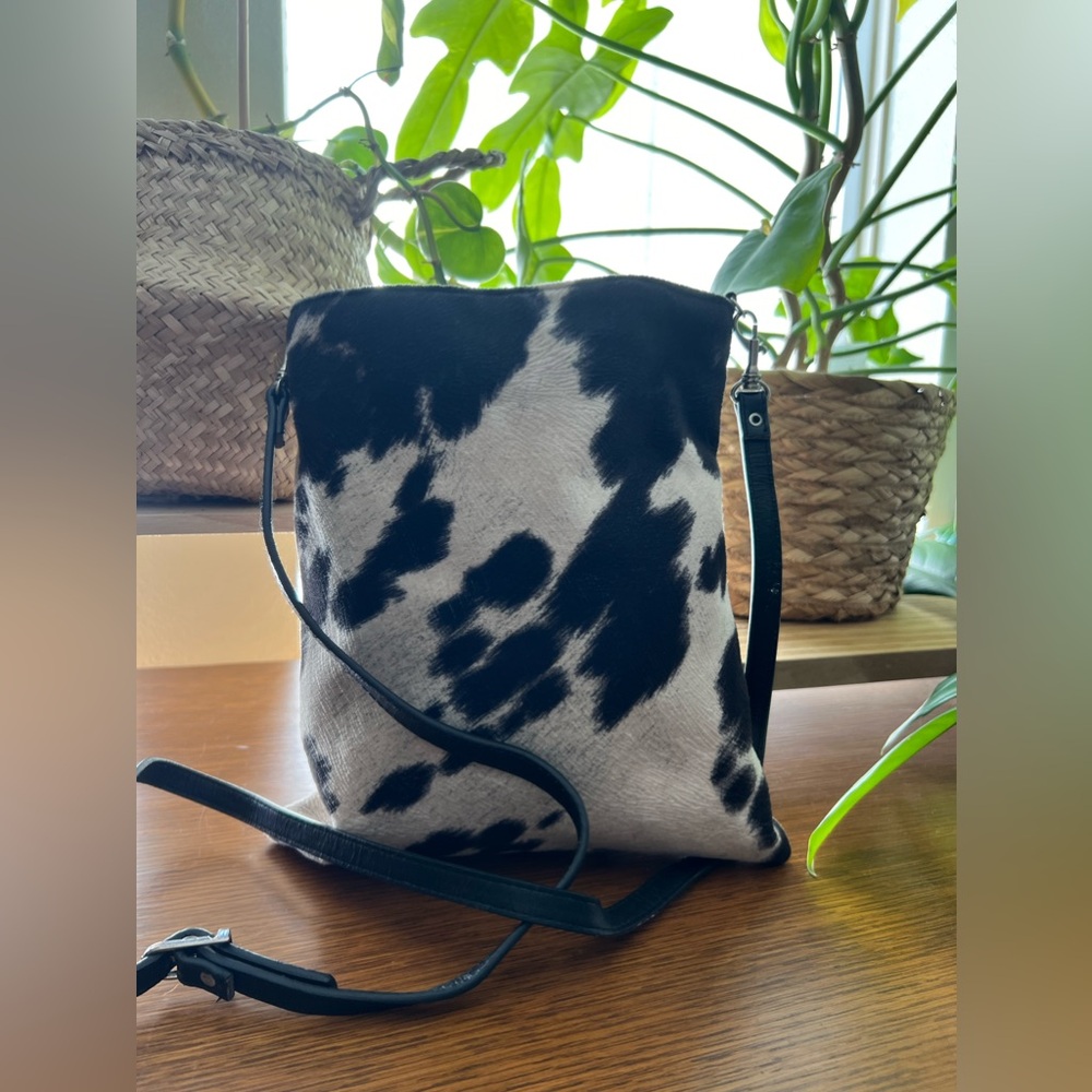 Faux black and white cow hide crossbody